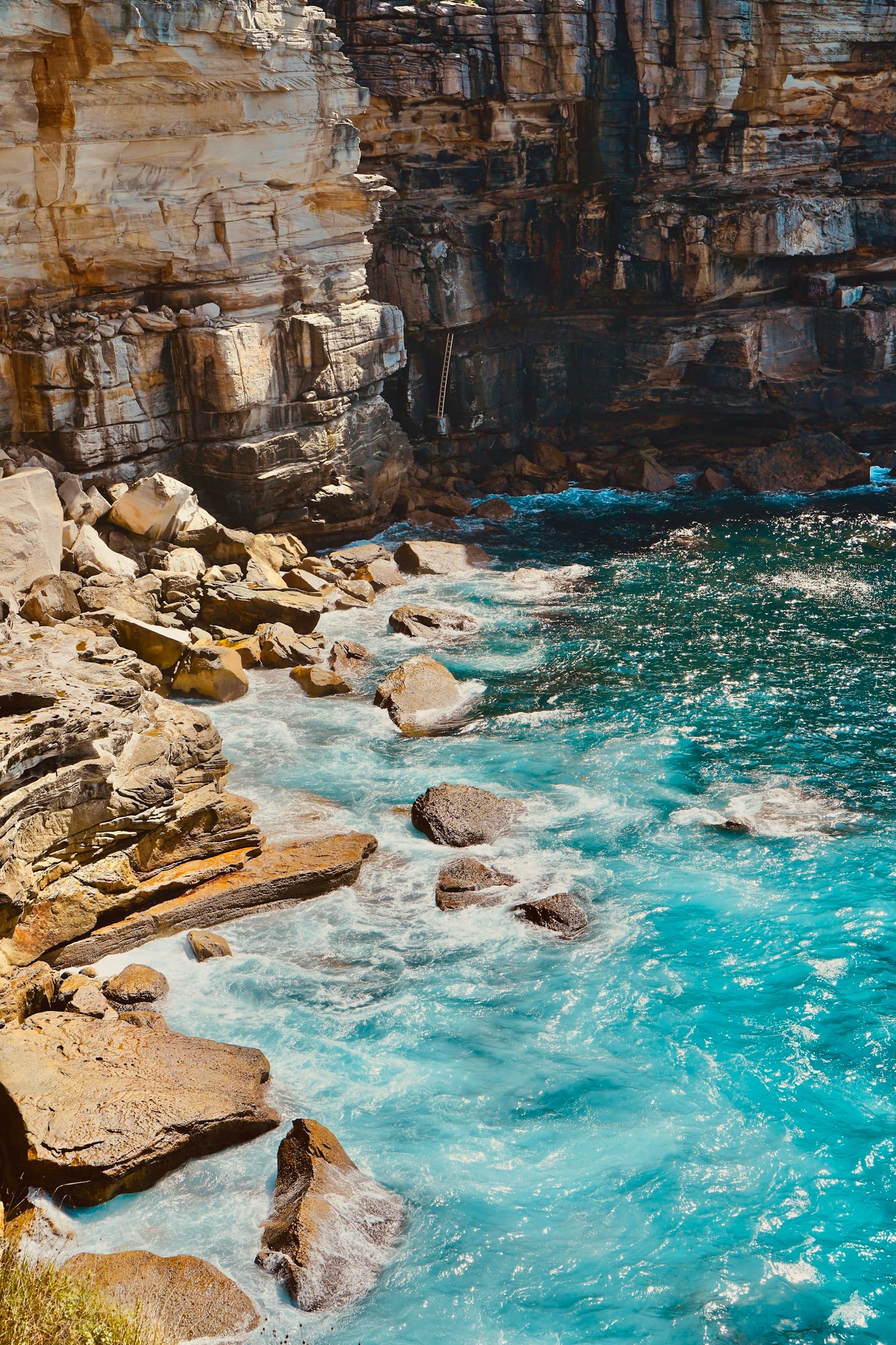 Australia: blue body of water near cliff