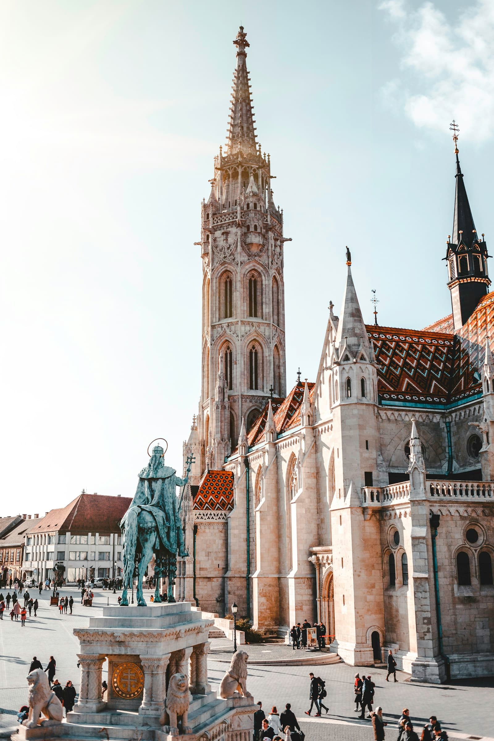 Hungary: crowded people walking near statue in cathedral