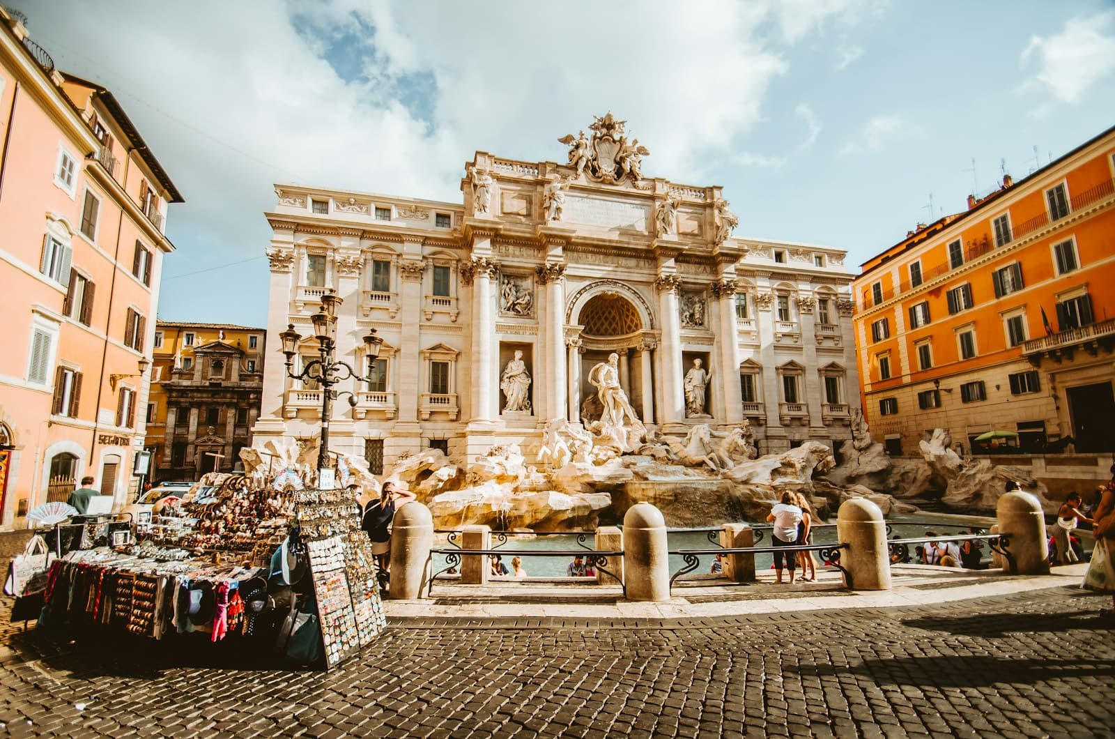 Rome: man standing in front of statue