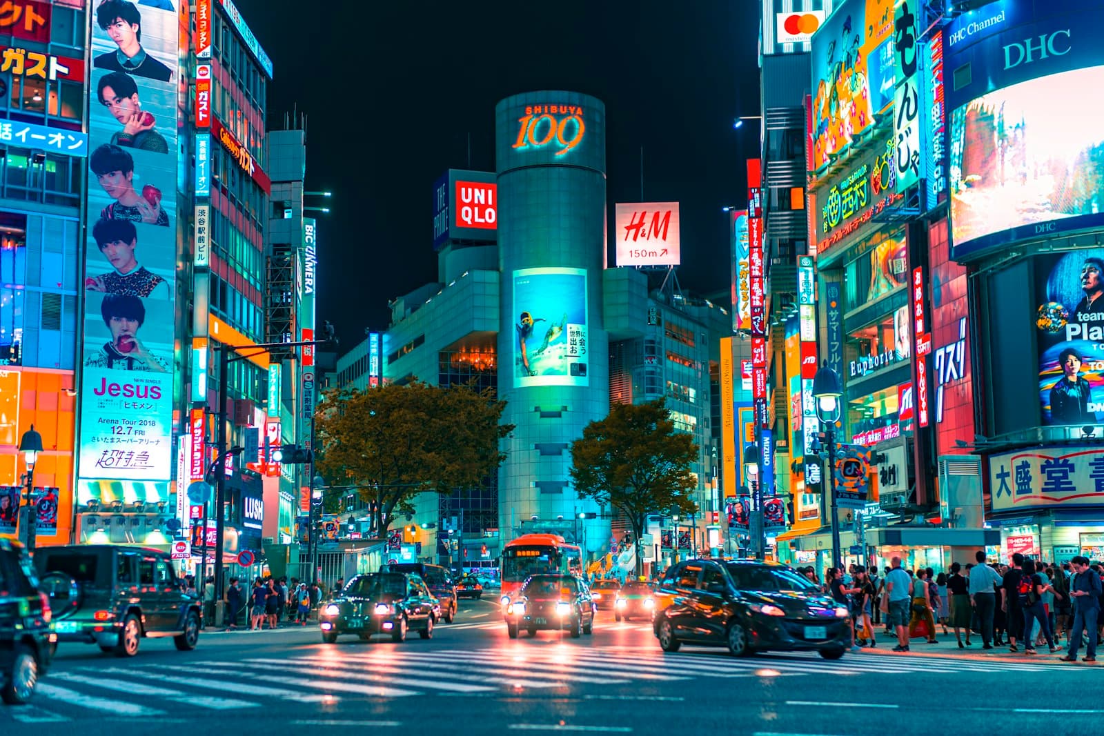 Tokyo: people gathered outside buildings and vehicles