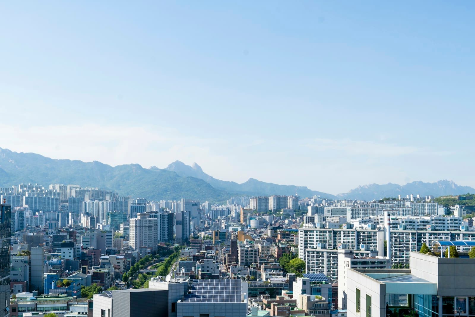 South Korea: a city with mountains in the background