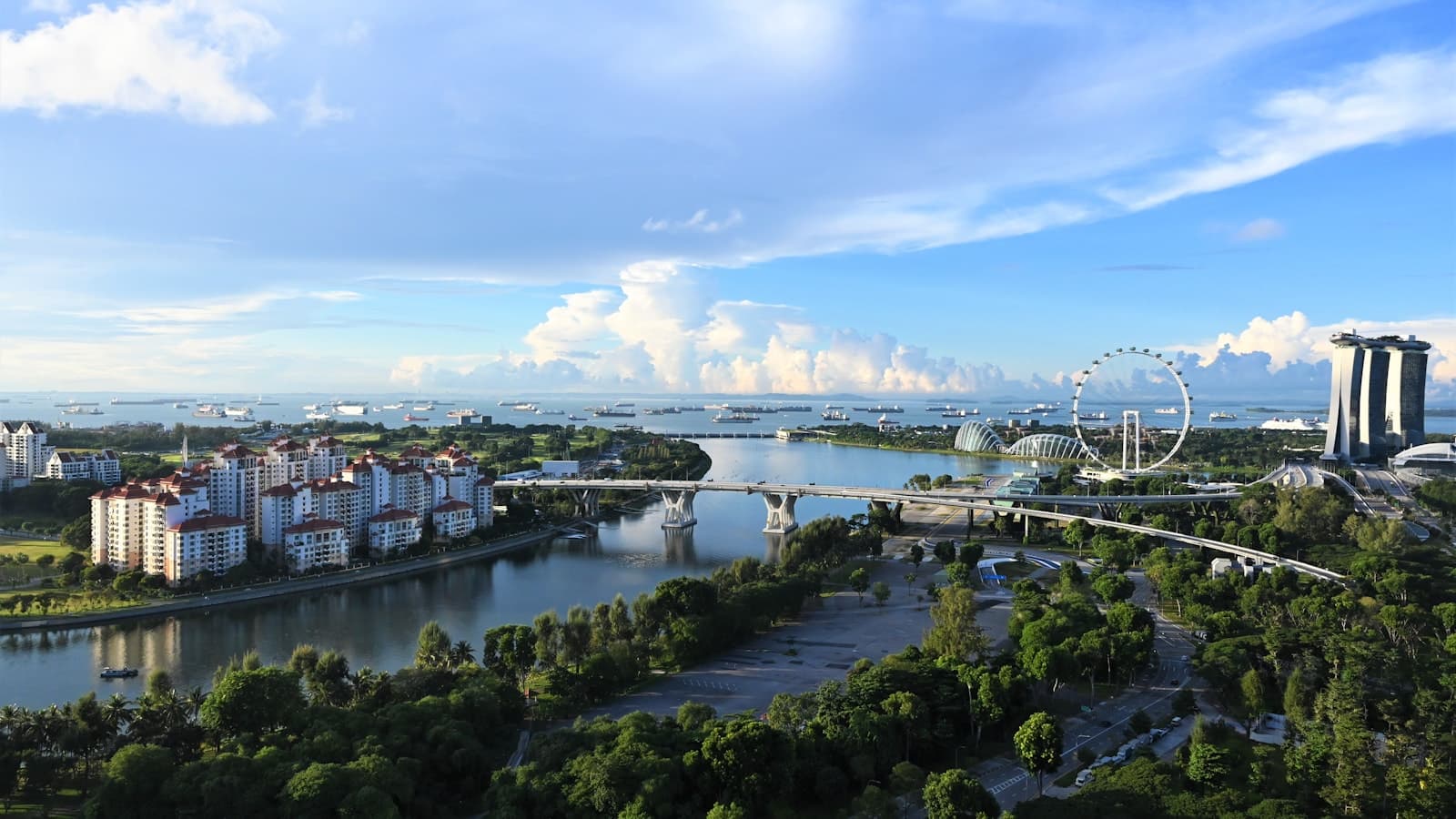 Singapore: aerial view of city buildings near body of water during daytime
